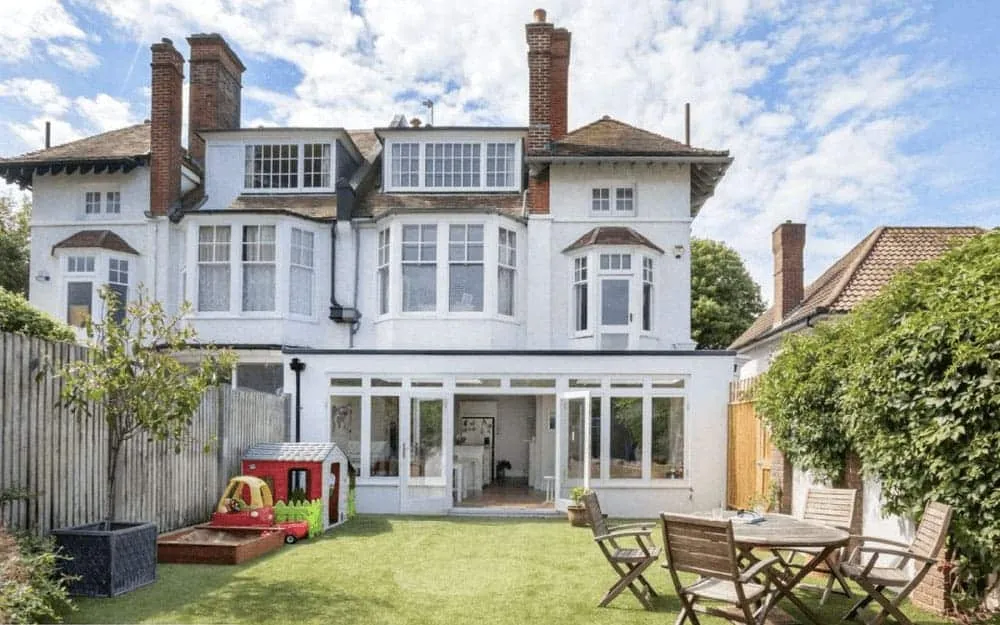 A large white house with lots of windows.